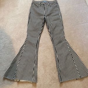 Black and white stripe flare jeans. Size 28. EUC.